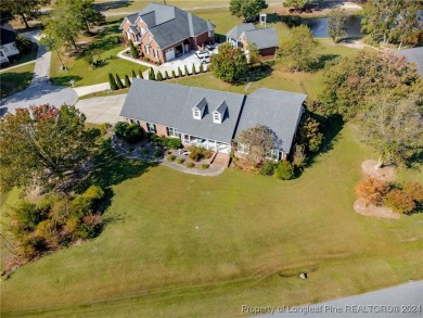 An exquisite home located in the Baywood Golf Community with 3 on Baywood Golf Club in North Carolina - for sale on GolfHomes.com, golf home, golf lot