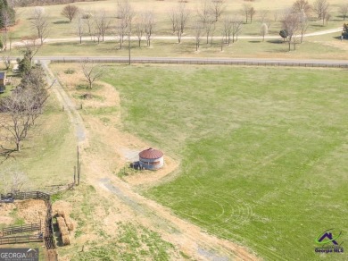 This exceptional property offers a prime location in the heart on Woods Golf Course in Georgia - for sale on GolfHomes.com, golf home, golf lot