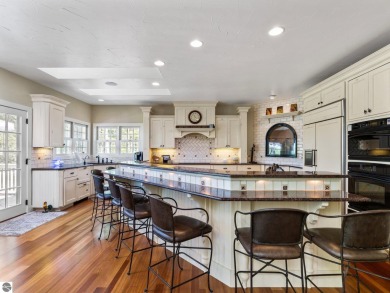 Welcome to this stunning 5-bedroom, 5.5-bath estate on Crystal Mountain Golf Course in Michigan - for sale on GolfHomes.com, golf home, golf lot