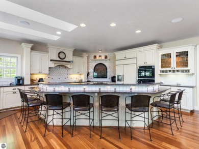 Welcome to this stunning 5-bedroom, 5.5-bath estate on Crystal Mountain Golf Course in Michigan - for sale on GolfHomes.com, golf home, golf lot