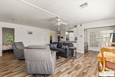 Enjoy gorgeous lakefront views from this coveted triple-wide on  in California - for sale on GolfHomes.com, golf home, golf lot
