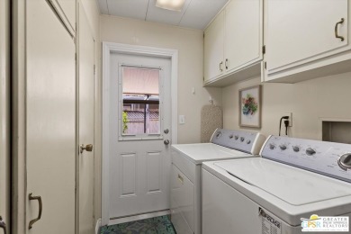 With a private setting on an elevated street in Cathedral City's on Date Palm Country Club in California - for sale on GolfHomes.com, golf home, golf lot