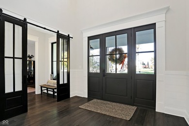 Experience Luxurious Living on the 11th Hole of Prestigious on Zionsville Golf Course in Indiana - for sale on GolfHomes.com, golf home, golf lot