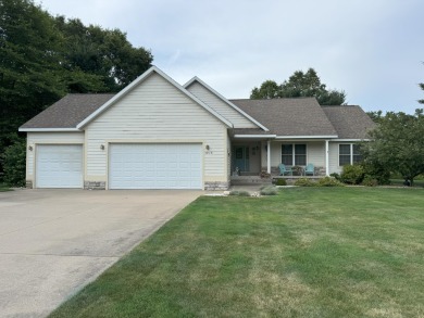 Nestled beside the picturesque Stonegate Golf Course, this on Stonegate Golf Club in Michigan - for sale on GolfHomes.com, golf home, golf lot