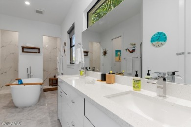 Exquisite modern contemporary 4 Bedroom 3 bath pool home in on Royal Tee Country Club in Florida - for sale on GolfHomes.com, golf home, golf lot
