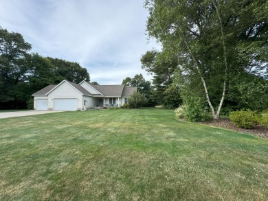 Nestled beside the picturesque Stonegate Golf Course, this on Stonegate Golf Club in Michigan - for sale on GolfHomes.com, golf home, golf lot