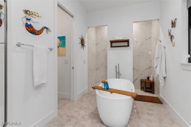 Exquisite modern contemporary 4 Bedroom 3 bath pool home in on Royal Tee Country Club in Florida - for sale on GolfHomes.com, golf home, golf lot