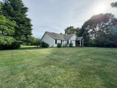 Nestled beside the picturesque Stonegate Golf Course, this on Stonegate Golf Club in Michigan - for sale on GolfHomes.com, golf home, golf lot