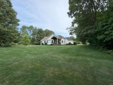 Nestled beside the picturesque Stonegate Golf Course, this on Stonegate Golf Club in Michigan - for sale on GolfHomes.com, golf home, golf lot