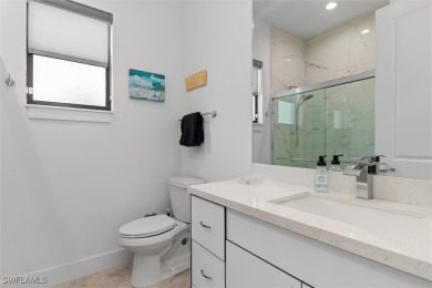 Exquisite modern contemporary 4 Bedroom 3 bath pool home in on Royal Tee Country Club in Florida - for sale on GolfHomes.com, golf home, golf lot
