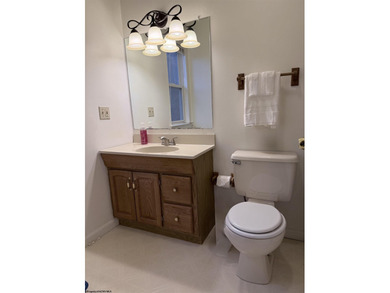 Well kept townhome in convenient location. Large Primary bedroom on Bel Meadow Country Club in West Virginia - for sale on GolfHomes.com, golf home, golf lot