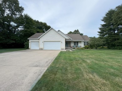 Nestled beside the picturesque Stonegate Golf Course, this on Stonegate Golf Club in Michigan - for sale on GolfHomes.com, golf home, golf lot