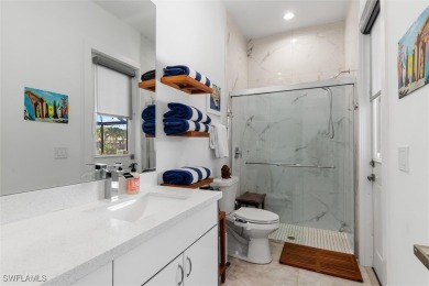 Exquisite modern contemporary 4 Bedroom 3 bath pool home in on Royal Tee Country Club in Florida - for sale on GolfHomes.com, golf home, golf lot