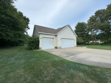 Nestled beside the picturesque Stonegate Golf Course, this on Stonegate Golf Club in Michigan - for sale on GolfHomes.com, golf home, golf lot