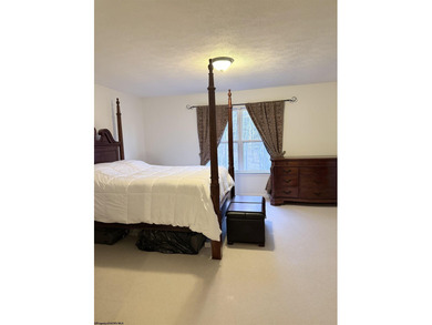 Well kept townhome in convenient location. Large Primary bedroom on Bel Meadow Country Club in West Virginia - for sale on GolfHomes.com, golf home, golf lot