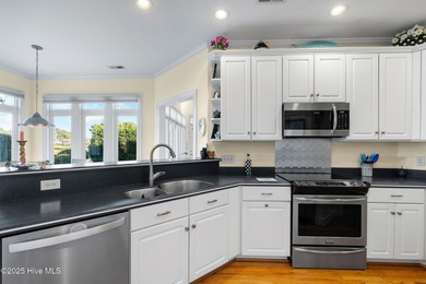 Welcome to this beautifully maintained home in the heart of St on Members Club At St. James Plantation in North Carolina - for sale on GolfHomes.com, golf home, golf lot