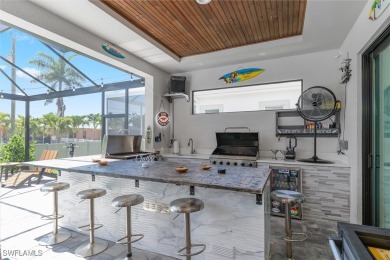 Exquisite modern contemporary 4 Bedroom 3 bath pool home in on Royal Tee Country Club in Florida - for sale on GolfHomes.com, golf home, golf lot