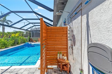 Exquisite modern contemporary 4 Bedroom 3 bath pool home in on Royal Tee Country Club in Florida - for sale on GolfHomes.com, golf home, golf lot