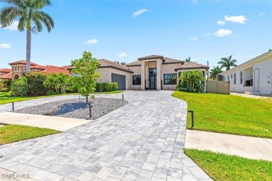 Exquisite modern contemporary 4 Bedroom 3 bath pool home in on Royal Tee Country Club in Florida - for sale on GolfHomes.com, golf home, golf lot