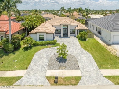 Exquisite modern contemporary 4 Bedroom 3 bath pool home in on Royal Tee Country Club in Florida - for sale on GolfHomes.com, golf home, golf lot
