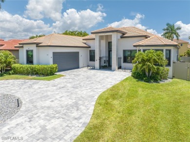 Exquisite modern contemporary 4 Bedroom 3 bath pool home in on Royal Tee Country Club in Florida - for sale on GolfHomes.com, golf home, golf lot