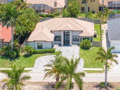 Exquisite modern contemporary 4 Bedroom 3 bath pool home in on Royal Tee Country Club in Florida - for sale on GolfHomes.com, golf home, golf lot