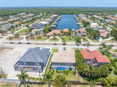 Exquisite modern contemporary 4 Bedroom 3 bath pool home in on Royal Tee Country Club in Florida - for sale on GolfHomes.com, golf home, golf lot