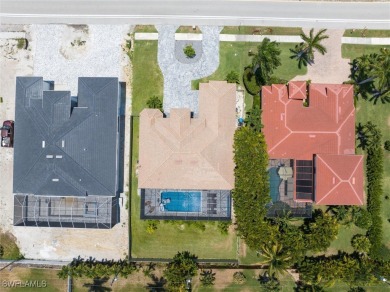 Exquisite modern contemporary 4 Bedroom 3 bath pool home in on Royal Tee Country Club in Florida - for sale on GolfHomes.com, golf home, golf lot