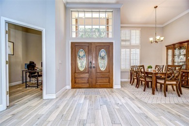 Welcome to this stunning 4-bedroom, 3-bath, 3-car garage SMART on Bloomingdale Golfers Club in Florida - for sale on GolfHomes.com, golf home, golf lot