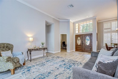 Welcome to this stunning 4-bedroom, 3-bath, 3-car garage SMART on Bloomingdale Golfers Club in Florida - for sale on GolfHomes.com, golf home, golf lot