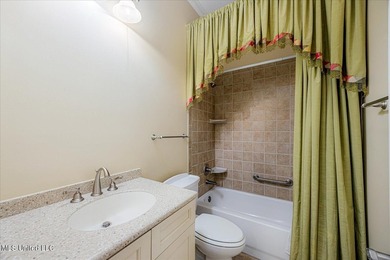 Majestic and meticulously crafted, this exceptional residence in on Wedgewood Golfers Club in Mississippi - for sale on GolfHomes.com, golf home, golf lot