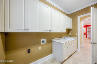 Majestic and meticulously crafted, this exceptional residence in on Wedgewood Golfers Club in Mississippi - for sale on GolfHomes.com, golf home, golf lot