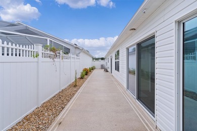 PRIVACY, BEAUTY, GORGEOUS SUNSETS & EASY LIVING in this Upgraded on The Links of Spruce Creek in Florida - for sale on GolfHomes.com, golf home, golf lot