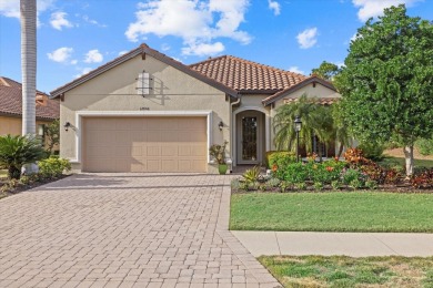 Welcome to this breathtaking Lazio model home located in the on Esplanade Golf and Country at Lakewood Ranch in Florida - for sale on GolfHomes.com, golf home, golf lot