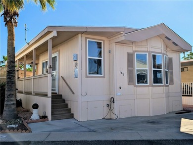 This is a beautiful rare 16 foot wide park model. Feels just on Riverview Golf Course in Arizona - for sale on GolfHomes.com, golf home, golf lot