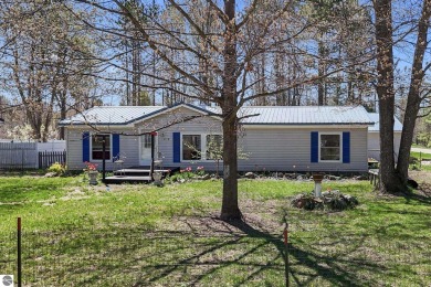 This 3-bedroom, 2-bath home in Kalkaska's Drydock community on Twin Birch Golf Club in Michigan - for sale on GolfHomes.com, golf home, golf lot