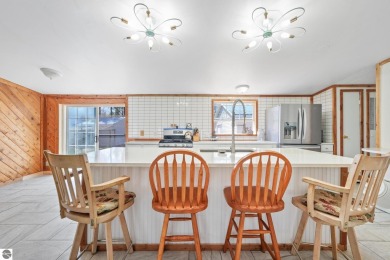 This 3-bedroom, 2-bath home in Kalkaska's Drydock community on Twin Birch Golf Club in Michigan - for sale on GolfHomes.com, golf home, golf lot