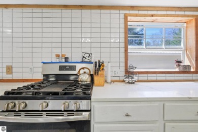 This 3-bedroom, 2-bath home in Kalkaska's Drydock community on Twin Birch Golf Club in Michigan - for sale on GolfHomes.com, golf home, golf lot