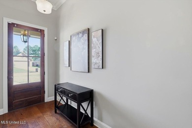 This thoughtfully designed home features quality construction on Patrick Farms Golf Club in Mississippi - for sale on GolfHomes.com, golf home, golf lot