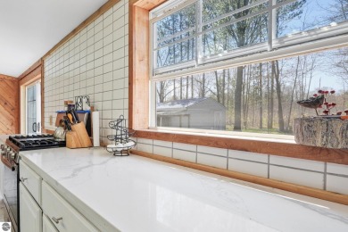 This 3-bedroom, 2-bath home in Kalkaska's Drydock community on Twin Birch Golf Club in Michigan - for sale on GolfHomes.com, golf home, golf lot