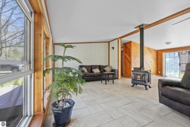 This 3-bedroom, 2-bath home in Kalkaska's Drydock community on Twin Birch Golf Club in Michigan - for sale on GolfHomes.com, golf home, golf lot