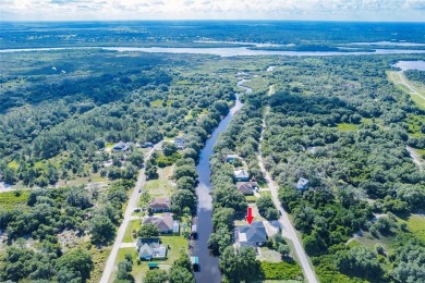 5 BED 3 BATH WATERFRONT CANAL POOL HOME WITH WATER ACCESS TO THE on Deep Creek Golf Club in Florida - for sale on GolfHomes.com, golf home, golf lot