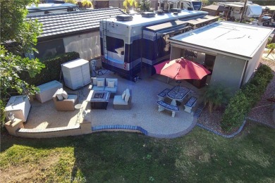 Site 246 has the perfect Sun Rise, water and Golf Views.  Patio on Rancho California RV Resort in California - for sale on GolfHomes.com, golf home, golf lot