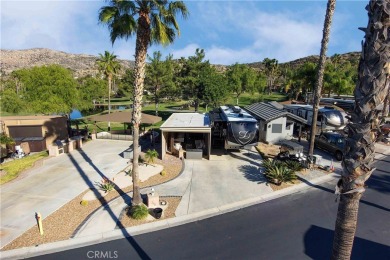 Site 246 has the perfect Sun Rise, water and Golf Views.  Patio on Rancho California RV Resort in California - for sale on GolfHomes.com, golf home, golf lot