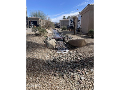 Extra large lot & beautiful large patio area & tree! Lot on The Refuge Golf and Country Club in Arizona - for sale on GolfHomes.com, golf home, golf lot