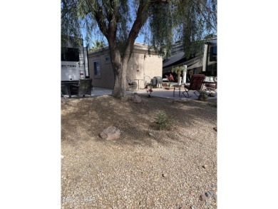 Extra large lot & beautiful large patio area & tree! Lot on The Refuge Golf and Country Club in Arizona - for sale on GolfHomes.com, golf home, golf lot