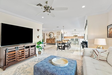 Beautifully reimagined 2-bedroom plus den residence, ideally on Quail Ridge Golf Course and Country Club in Florida - for sale on GolfHomes.com, golf home, golf lot