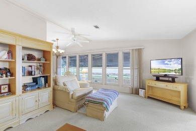 Enjoy golf course views from this well-maintained 2-bedroom on Orange Blossom Hills Golf and Country Club in Florida - for sale on GolfHomes.com, golf home, golf lot