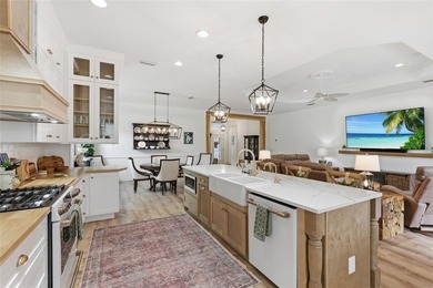 Tucked inside the gates of Boca Royale, this exceptional on Boca Royale Golf and Country Club in Florida - for sale on GolfHomes.com, golf home, golf lot