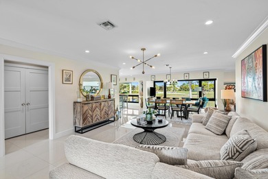 Beautifully reimagined 2-bedroom plus den residence, ideally on Quail Ridge Golf Course and Country Club in Florida - for sale on GolfHomes.com, golf home, golf lot